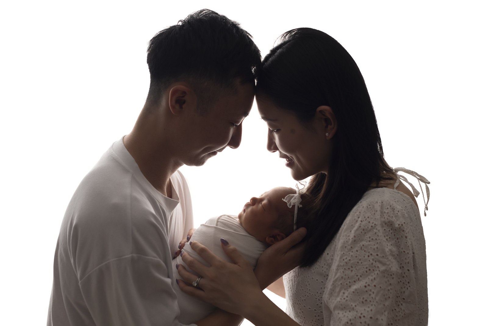 Newborn in blue heart wrap at Baltimore studio